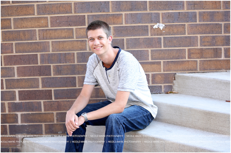 001-mason-senior-boy-downtown-bridge-portrait-session-sioux-falls-sd