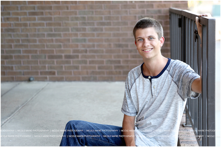 005-mason-senior-boy-downtown-bridge-portrait-session-sioux-falls-sd