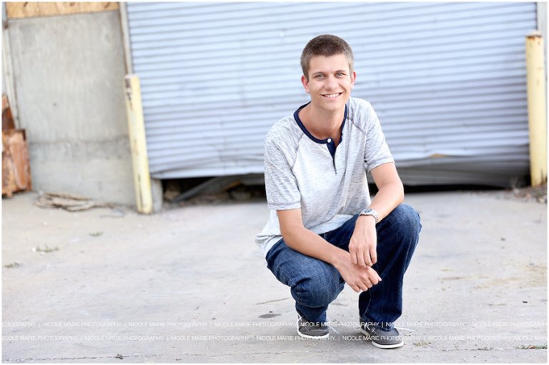 007-mason-senior-boy-downtown-bridge-portrait-session-sioux-falls-sd